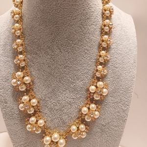 Gold, faux pearl and crystal stone necklace.